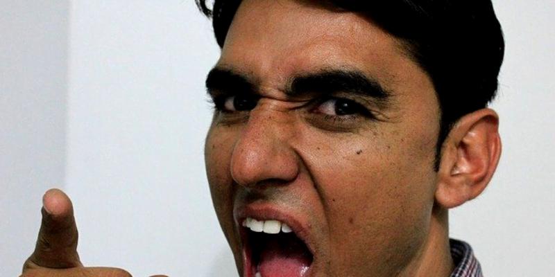 This man appears angry -- an emotion leading to aggression, not assertiveness.