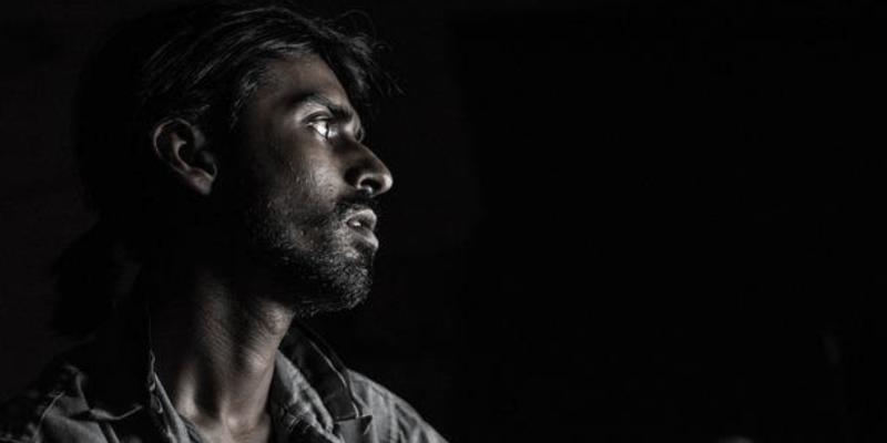 Depressed man who feels all alone because no one cares about him.